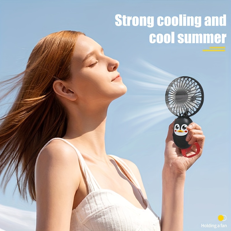 a mini fan with usb charging for cool summer cartoon cute penguins and long battery life suitable for home outdoor sports and outdoor work details 1